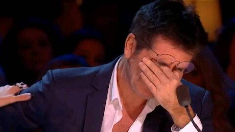 Simon Cowell fights tears during Nightbirde's emotional return.