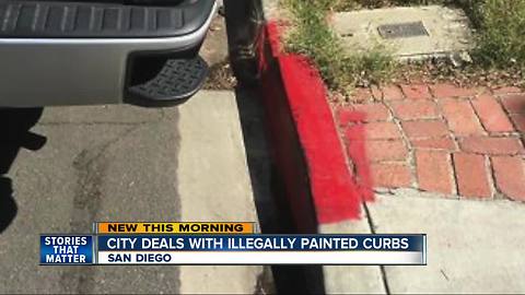 City battles illegally painted red curbs