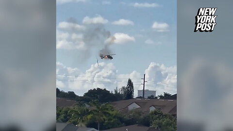 Air rescue helicopter crashes into Florida apartment building