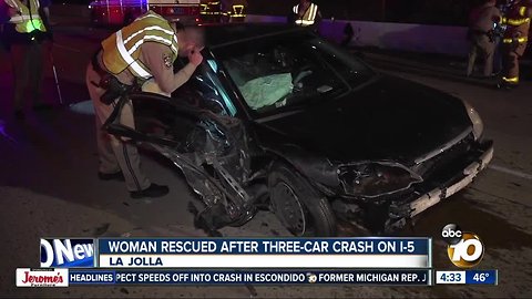 Woman, dogs rescued from car after I-5 crash