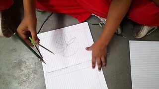 Students making geometric art