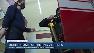 Mobile team distributing vaccines