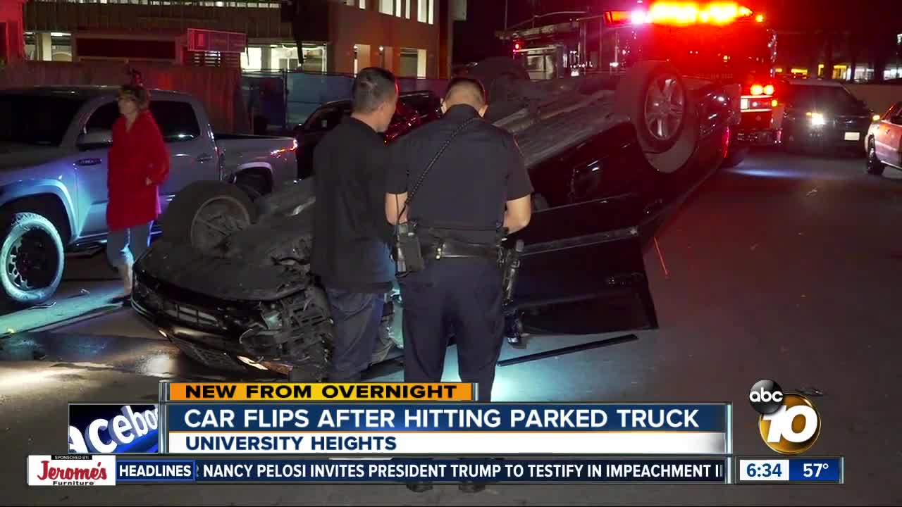 Car flips over after hitting truck in University Heights