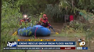 Crews rescue group from flood water