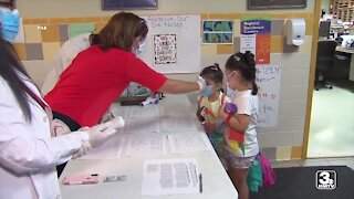 Local health officials urge educators to get vaccinated as school year nears and COVID cases are rising