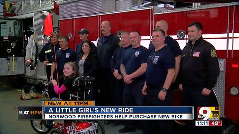 Firefighters help buy little girl's first bike