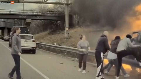 Good Samaritans Pull A Driver From A Car Engulfed In Flames