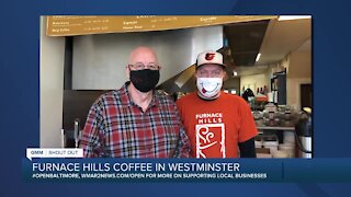 Furnace Hills Coffee in Westminster says "We're Open Baltimore!"