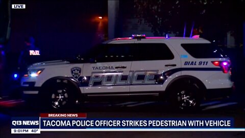 Tacoma cop runs over pedestrian after being surrounded