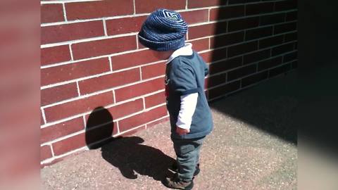 Adorable Toddler Boy Puzzled By His Shadow