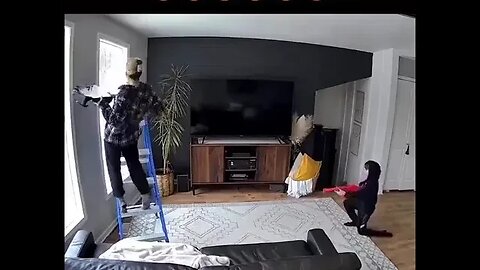 Kid Shoots His Mom In The Butt Atop The Ladder Painting. Now He's Grounded For The Rest Of His Life