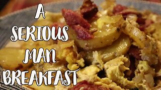 The Ultimate Breakfast Feast: Home Fries, Eggs, Onions, and Smoked Sausage