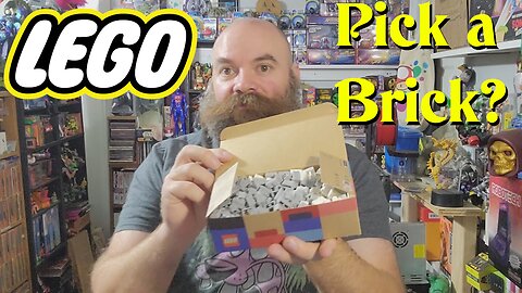 Cramming Lego into a box. Pick a Brick Wall