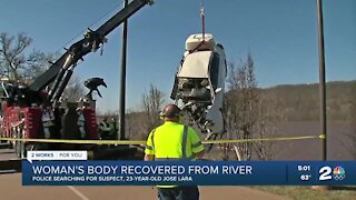 Woman's body recovered from river, police searching for suspect