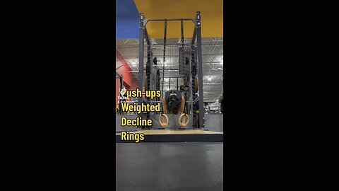 Ring push-ups with weight vest and decline