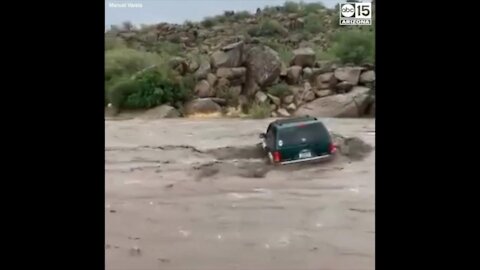 VIDEO: Group rescued from floodwaters, overturned SUV at Sycamore Creek