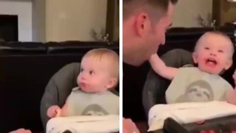 The child got scared when dad swallowed his hand