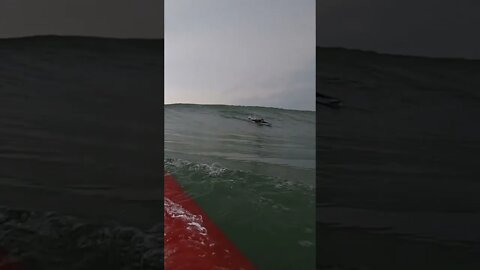 Two surfers experience the same moment very differently