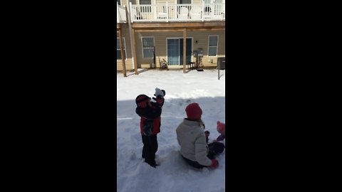 Mommy gets crowned with huge snowball