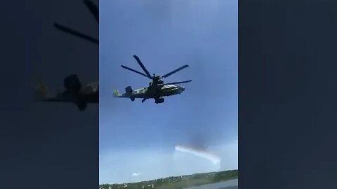 Russians flying Ka-52 entertain people on the beach in Alchevsk.