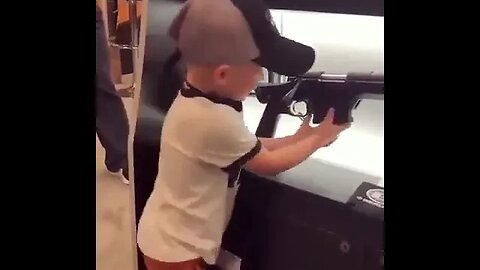 4 year old shows off his gun skills