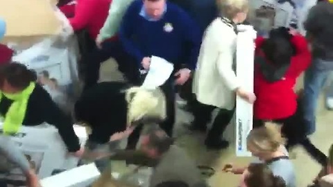 Black Friday shoppers fight over cheap TVs