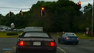 Speeds up to run red light