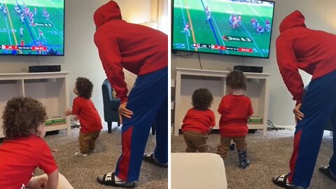 Toddlers adorably imitate their dad watching football game