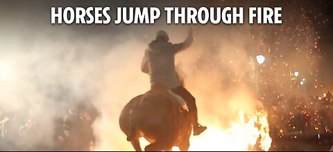 Horses jump through 'purifying' fire during Las Luminarias festival in Spain