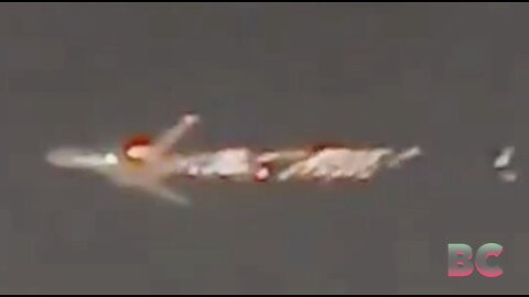 Flames seen shooting out of a Boeing 747, prompting an emergency landing in Miami