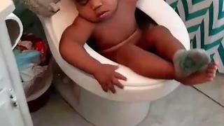 Boy Falls Asleep In Toilet Bowl