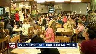 Parents protest school ranking system