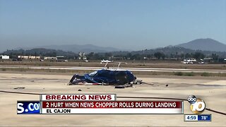 2 injured when news chopper rolls during landing