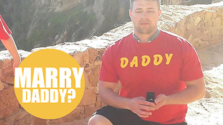 Man proposes with three children wearing t-shirts spelling out 'will you marry daddy?'