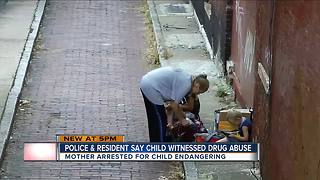 PD: Woman used drugs in alley with child present