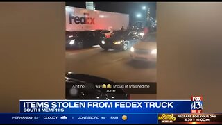 Dozens of people mob FedEx truck steal packages in the middle of the street