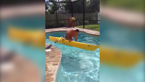 "Man Falls Into Pool While Practicing Getting In Kayak"