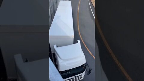 Experienced lorry driver doing his job with perfection
