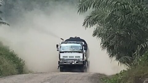 The truck steps on the gas until there is a lot of smoke