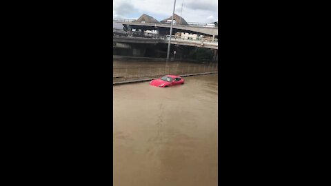 Eight people rescued after burst water main floods London road