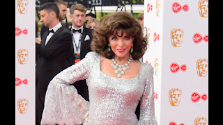 Joan Collins calls police after spotting 'maskless workmen on her balcony'