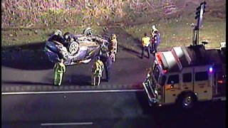 Car on its roof just before Miller Road on I-77 SB