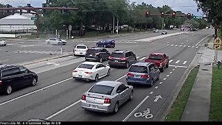 Police release video of car running red light, causing crash