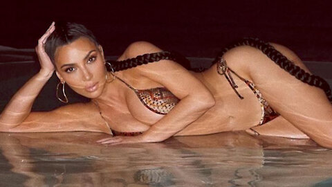 Kim Kardashian’s SnakeSkin Bikini Photoshoot Sparks BACKLASH Amidst Kanye West’s Mental Breakdown!