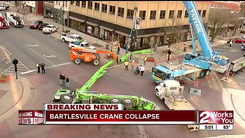 Crane tips over in downtown Bartlesville