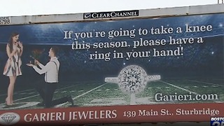 Massachusetts jewelry store under fire over 'take a knee' billboard