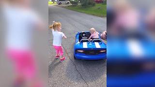 A Tot Girl Dances To Thriller In A Middle Of A Street