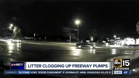 Litter clogging freeway pumps as they work to drain water