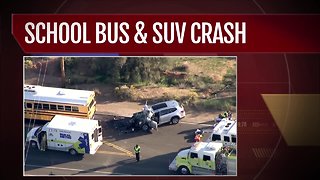 One rushed to hospital after car collides with school bus in north Scottsdale