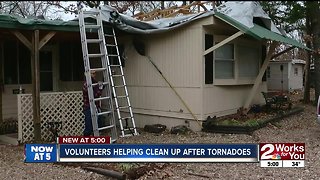Volunteers helping clean up after tornadoes